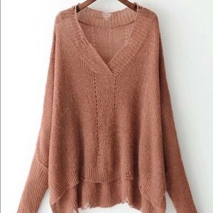 Ripped dropped neckline sweater